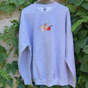 Hand embroidered crewneck sweatshirt